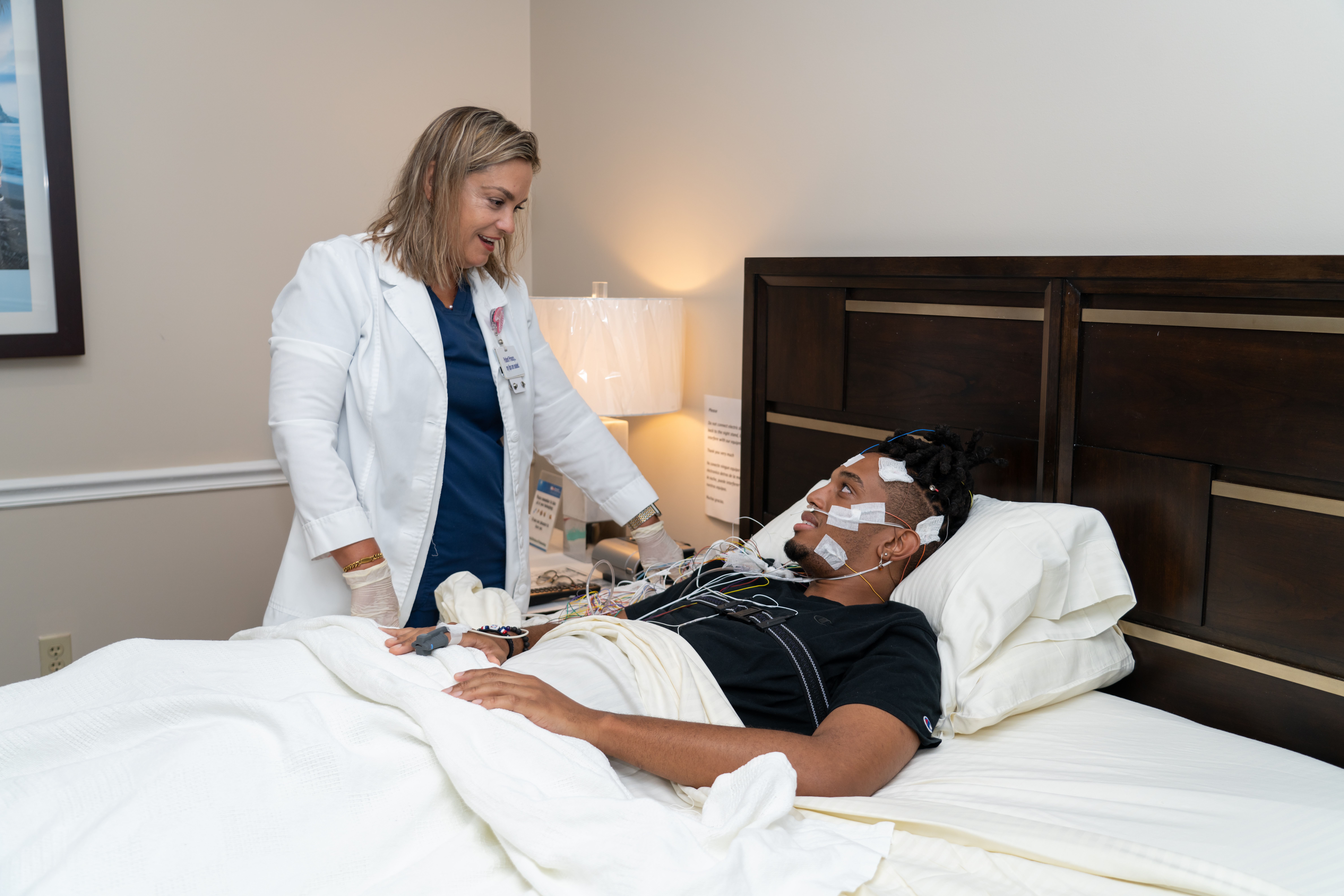 clinician with patient in sleep center
